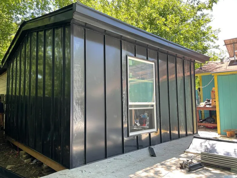 Black standing seam metal wall panels for Metal Roof Installation in Asbury