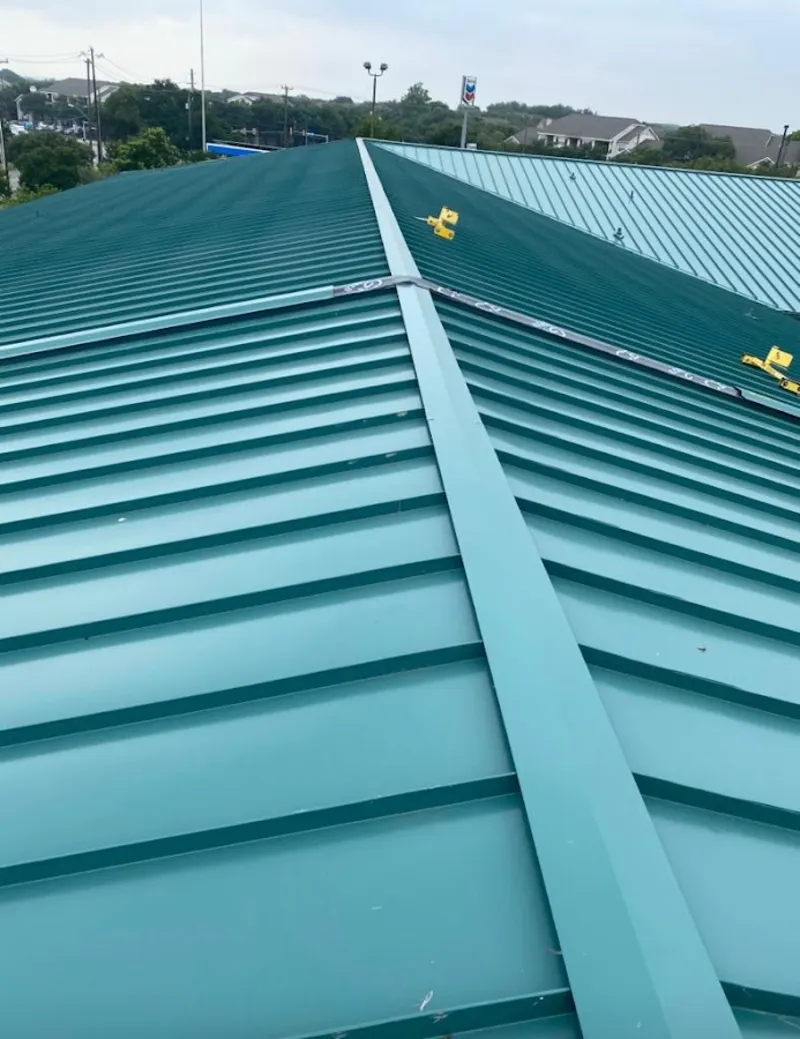 Green commercial metal roof ridge and valley for Metal Roof Repair in Asbury