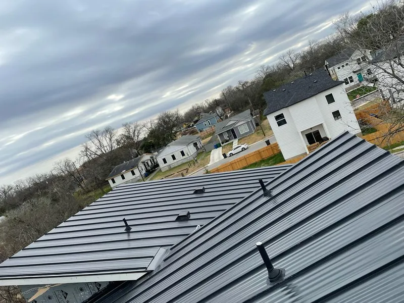 Standing seam metal roof panels with vents for Skylight Repair in Asbury